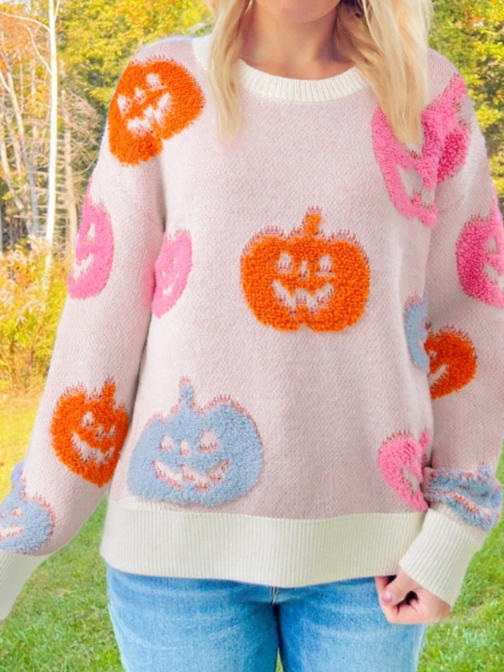 F2- Women's Pink Crewneck Sweater with Festive Pumpkin Motifs